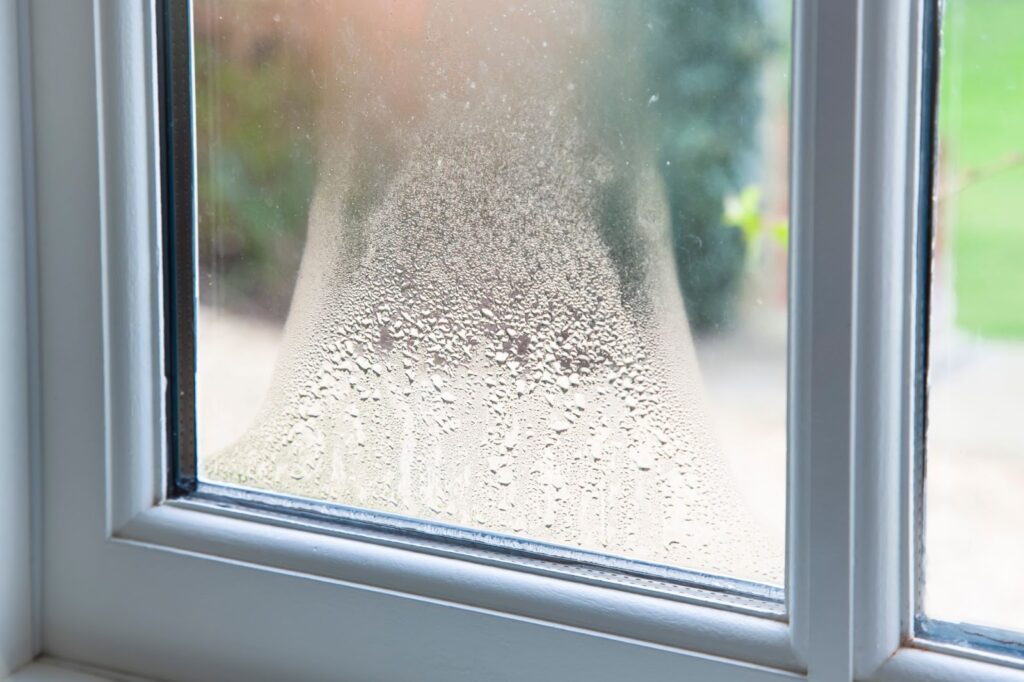 Water droplets on a window, potential window damage prevention in the home.